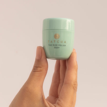 Hand holding the Rice Polish Deep, mini